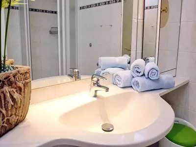 Ein Badezimmer in der Unterkunft Trelleborgallee, Fewo 132