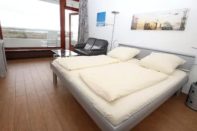 Ein Bett oder Betten in einem Zimmer der Unterkunft Trelleborgallee, Fewo 181