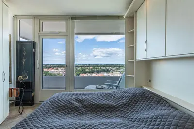 Ein Bett oder Betten in einem Zimmer der Unterkunft Trelleborgallee, Fewo 167