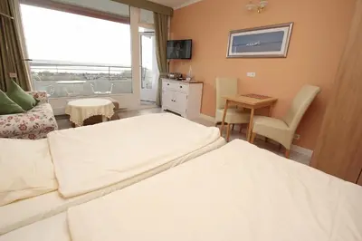 Ein Bett oder Betten in einem Zimmer der Unterkunft Trelleborgallee, Fewo 199