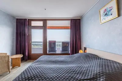 Ein Bett oder Betten in einem Zimmer der Unterkunft Trelleborgallee, Fewo 197
