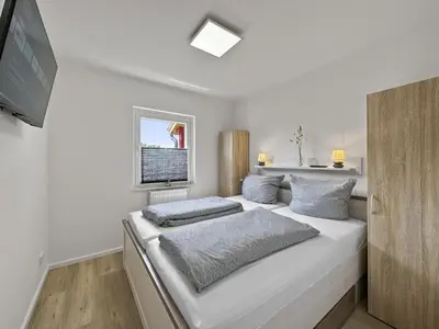 Ein Bett oder Betten in einem Zimmer der Unterkunft Objekt-Nr 243 - Ort - Lindwurmstraße