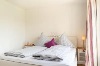 Ein Bett oder Betten in einem Zimmer der Unterkunft Ferienhaus Haff Huus 2 Haffkrug