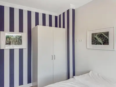 Ein Bett oder Betten in einem Zimmer der Unterkunft Objekt-Nr 62 - Strand - Kaiserallee