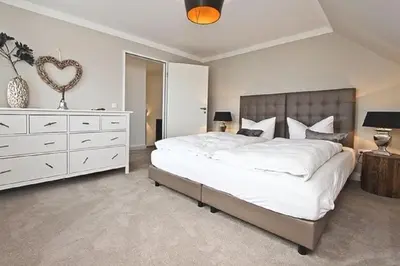 Ein Bett oder Betten in einem Zimmer der Unterkunft Apartment Ostseerausch