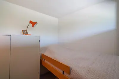 Ein Bett oder Betten in einem Zimmer der Unterkunft Ferienpark Sierksdorf App 165