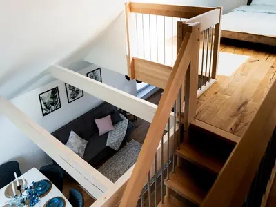 Ein Bett oder Betten in einem Zimmer der Unterkunft Flussblick am Töpferberg 8