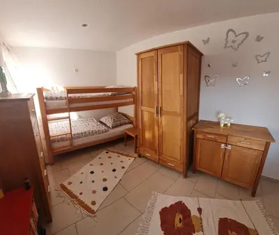 Ein Bett oder Betten in einem Zimmer der Unterkunft Ferienbucht Marina