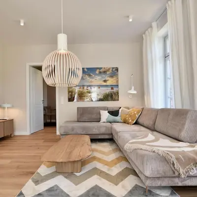 Ein Sitzbereich in der Unterkunft Schöne Aussicht Rosenhagen Haus 3