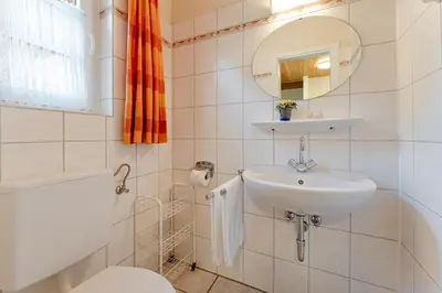 Ein Badezimmer in der Unterkunft Ferienparadies Seeweg 16