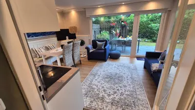 Küche/Küchenzeile in der Unterkunft Beach & Breeze Ferienwohnung mit Terrasse Scharbeutz