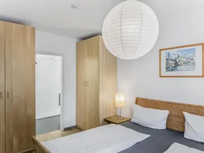 Ein Bett oder Betten in einem Zimmer der Unterkunft Objekt-Nr 186 - Strand - Backbord