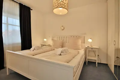 Ein Bett oder Betten in einem Zimmer der Unterkunft Haus Ostseeallee 10 Ostseeallee Appartement 68
