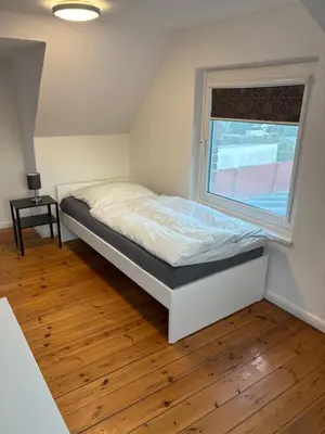 Ein Bett oder Betten in einem Zimmer der Unterkunft Haus für Handwerker und Monteure