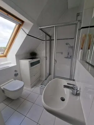 Ein Badezimmer in der Unterkunft PEMATRA FeWo Windrose