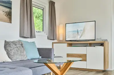 TV/Unterhaltungsangebot in der Unterkunft Süsel Seeparx Ferienhaus Tjelle