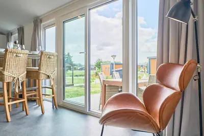 Ein Sitzbereich in der Unterkunft Süsel Seeparx Ferienhaus Se e hnsucht