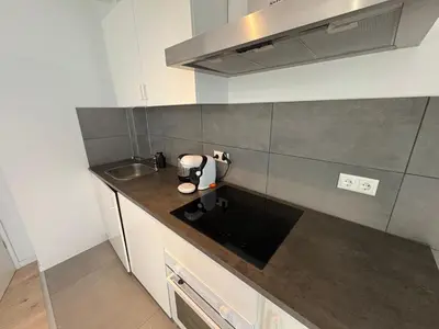 Küche/Küchenzeile in der Unterkunft Modernes 3 Zimmer Apartment - zentral - nahe Hamburg & Lübeck