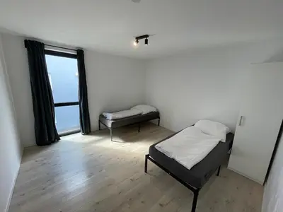 Ein Bett oder Betten in einem Zimmer der Unterkunft Modernes 3 Zimmer Apartment - zentral - nahe Hamburg & Lübeck