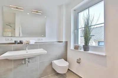 Ein Badezimmer in der Unterkunft Haus Oberdeck 2