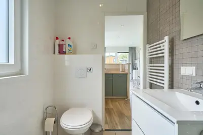 Ein Badezimmer in der Unterkunft Süsel Seeparx Ferienhaus Windspiel