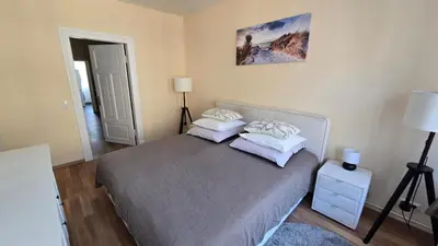 Ein Bett oder Betten in einem Zimmer der Unterkunft Schützen