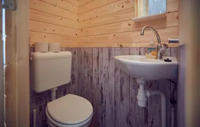Ein Badezimmer in der Unterkunft Süsel Seeparx Ferienhaus Wakehouse