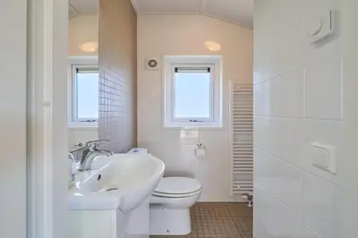 Ein Badezimmer in der Unterkunft Süsel Seeparx Ferienhaus Seezauber