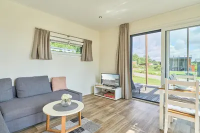 Ein Sitzbereich in der Unterkunft Süsel Seeparx Ferienhaus Sonnenschein