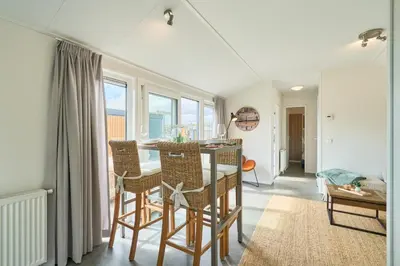 Ein Sitzbereich in der Unterkunft Süsel Seeparx Ferienhaus Seezeit