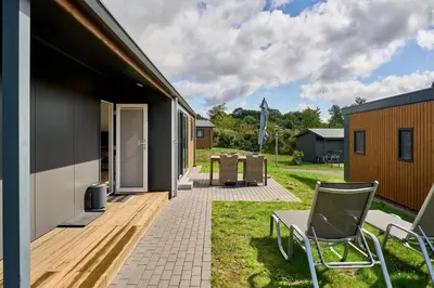 Ein Garten an der Unterkunft Süsel Seeparx Ferienhaus Seezeit