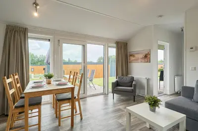 Ein Sitzbereich in der Unterkunft Süsel Seeparx Ferienhaus Seehafen
