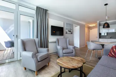 Ein Sitzbereich in der Unterkunft Godewindpark Deluxe-Suite 1-15