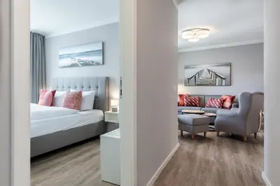 Ein Bett oder Betten in einem Zimmer der Unterkunft Godewindpark Deluxe-Suite 2-17