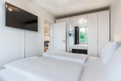 Ein Bett oder Betten in einem Zimmer der Unterkunft Godewindpark Exklusivsuite 3-02
