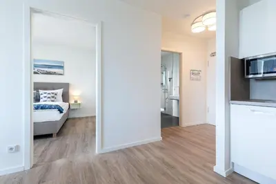 Ein Bett oder Betten in einem Zimmer der Unterkunft Godewindpark Exklusivsuite 3-15
