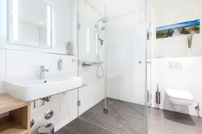 Ein Badezimmer in der Unterkunft Godewindpark Exklusivsuite 3-01