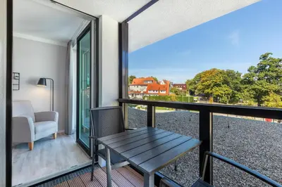 Ein Balkon oder eine Terrasse in der Unterkunft Deluxe-Suite 1-16 mit Gartenblick hundefreundlich