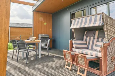 Ein Balkon oder eine Terrasse in der Unterkunft Süsel Seeparx Ferienhaus Sunshine