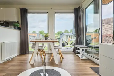 Ein Balkon oder eine Terrasse in der Unterkunft Süsel Seeparx Ferienhaus Sunshine