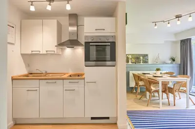 Küche/Küchenzeile in der Unterkunft Süsel Seeparx Ferienwohnung Seeblick