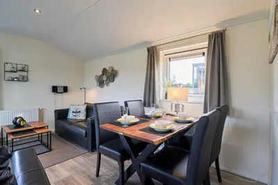 Ein Sitzbereich in der Unterkunft Süsel Seeparx Ferienhaus Seeglück