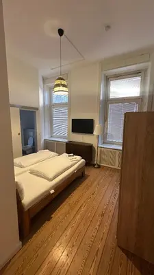 Ein Bett oder Betten in einem Zimmer der Unterkunft Hanse Room Lübeck