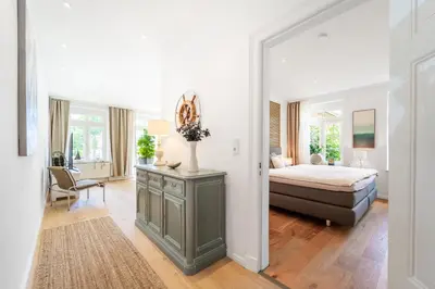 Ein Bett oder Betten in einem Zimmer der Unterkunft Wohlfühlen in Scharbeutz-Gleschendorf Komfort für 4