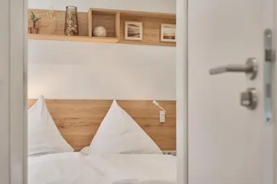 Ein Bett oder Betten in einem Zimmer der Unterkunft Dat schnieke lütte Huus