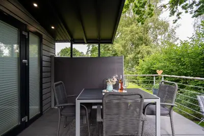 Ein Balkon oder eine Terrasse in der Unterkunft Mobilheim 