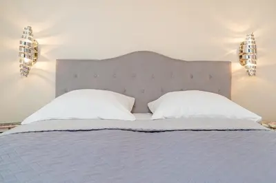 Ein Bett oder Betten in einem Zimmer der Unterkunft Strand Domizil Himmel & Meer