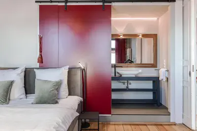 Ein Bett oder Betten in einem Zimmer der Unterkunft Strandvilla Strandpalais - historischer Charme in exklusiver Lage