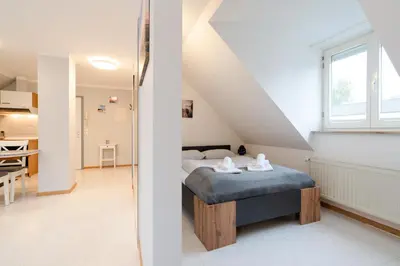 Ein Bett oder Betten in einem Zimmer der Unterkunft Ferienwohnung 