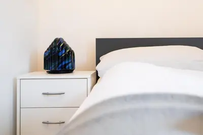 Ein Bett oder Betten in einem Zimmer der Unterkunft Ferienwohnung 